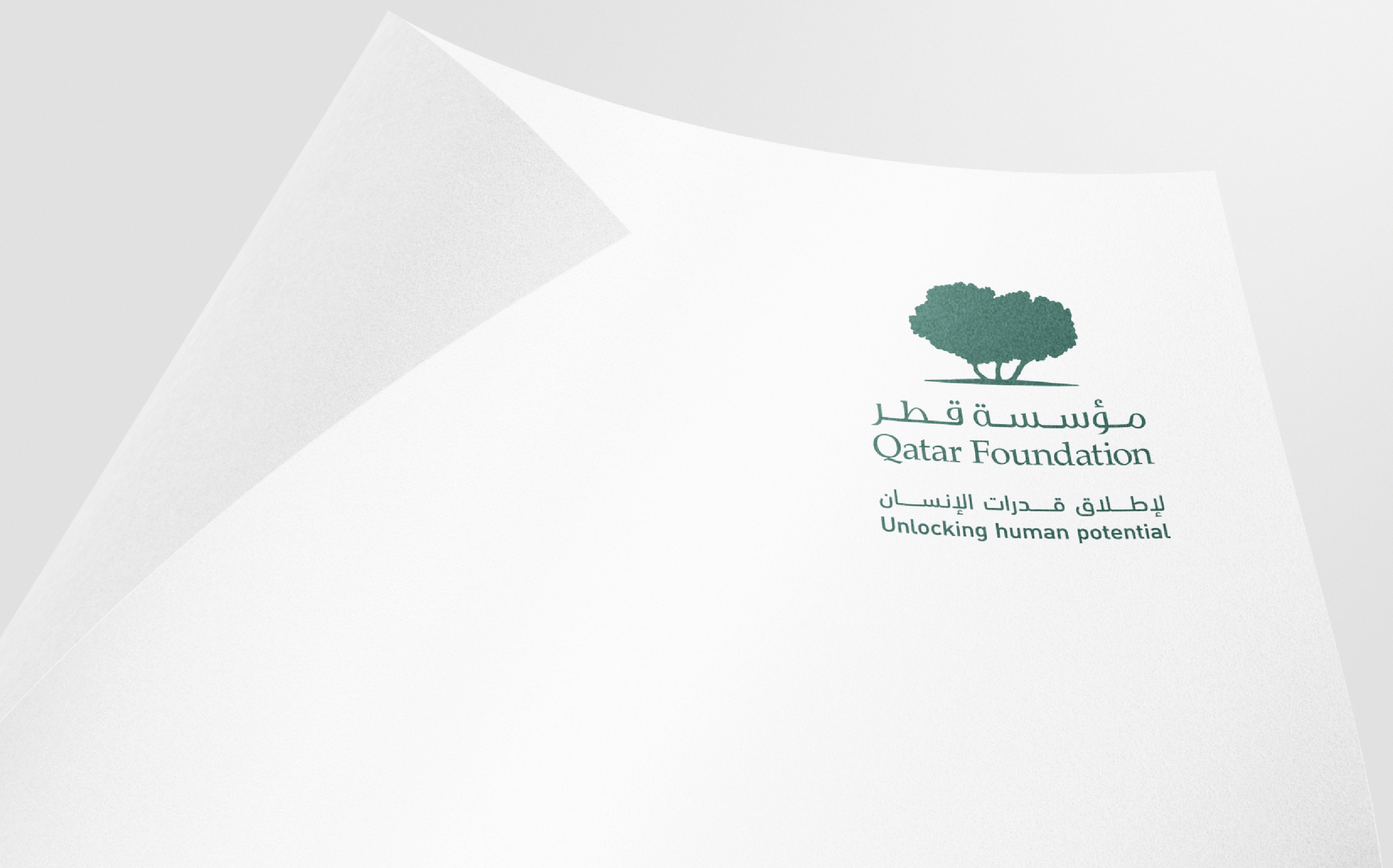 Qatar Foundation Sidra identity on textured stationery